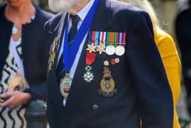 A highly-decorated veteran at Sleaford's Armed Forces Day flag-raising in 2023