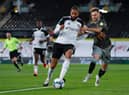Liam Waldock (right) shadows Fulham's Michael Hector during an EFL Cup tie with Sheffield Wednesday last season.