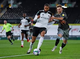 Liam Waldock (right) shadows Fulham's Michael Hector during an EFL Cup tie with Sheffield Wednesday last season.