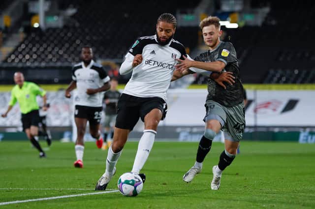 Liam Waldock (right) shadows Fulham's Michael Hector during an EFL Cup tie with Sheffield Wednesday last season.