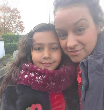 ​Laura Wootton and daughter Belle, 8.