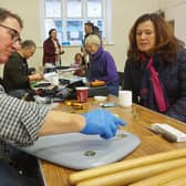 A previous Sleaford Repair Cafe. They are proving so popular more volunteer fixers are needed.