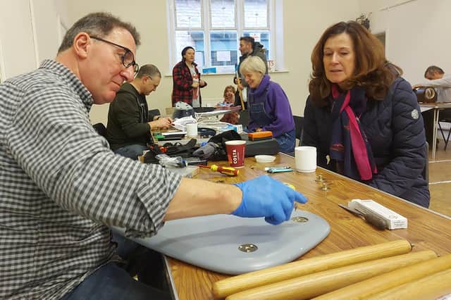 A previous Sleaford Repair Cafe. They are proving so popular more volunteer fixers are needed.