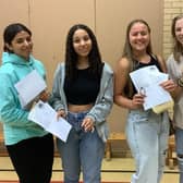 Four pupils collecting their results at Boston High School.