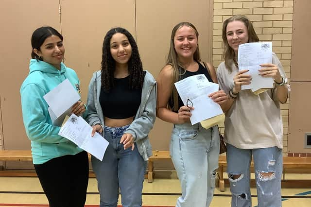 Four pupils collecting their results at Boston High School.