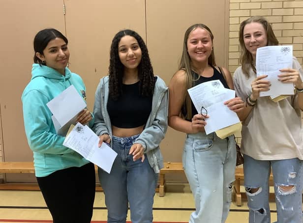 Four pupils collecting their results at Boston High School.