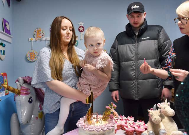 Lily gets ready to blow her candles out.