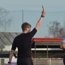 Jordan Nuttell being brandished his yellow card. (Joshua's Football Photography)