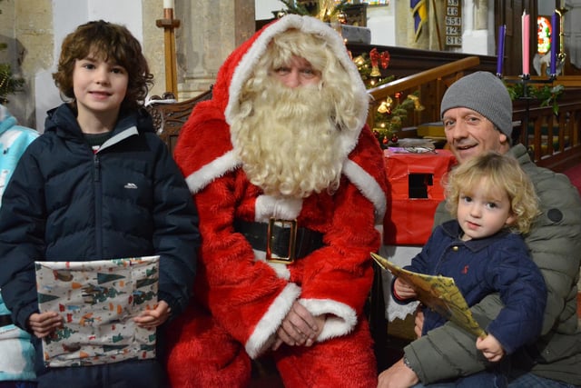 Fallon, Forrest and dad Anthony with Santa
