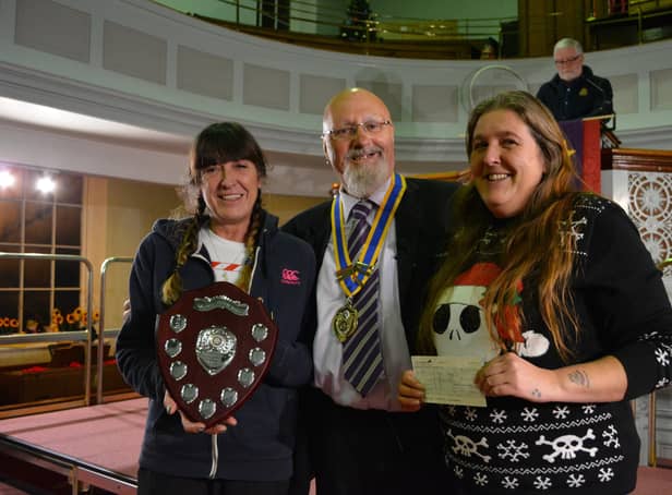 Rotary President John Moore presented the community award to Julie Lambie, left, and Sara Winter, founders of MRAG (Market Rasen Action Group)