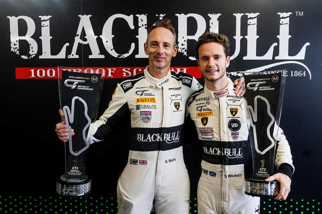 Shaun Balfe and Sandy Mitchell with their winners trophies.