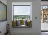 Create a cosy nook with cushions and pillows (photo: Express Bi-Folding Doors)