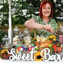 Lee Hubbard mans the Sweet Bar at Tanglewood Care Home's summer fair. Photos: Mick Fox