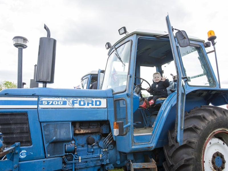 Theo Faupel, aged two, from Market Rasen, tries a tractor for size. Photo: Holly Parkinson