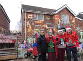 From left - Edward Miller, 14, is volunteering to help with the lights put up by, from left Jacky Cooper, Val and Mick Midgley on their Ruskington homes.