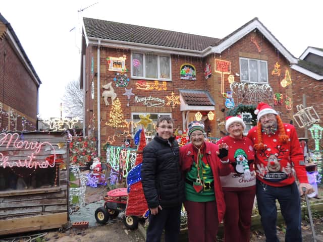 From left - Edward Miller, 14, is volunteering to help with the lights put up by, from left Jacky Cooper, Val and Mick Midgley on their Ruskington homes.