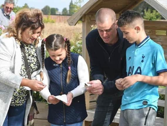 Nick and his family pictured at a previous butterfly release event at the Butterfly Hospice in Boston.