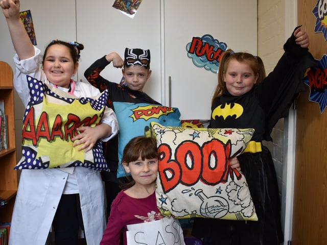Children dressed as colourful characters for World Book Day.