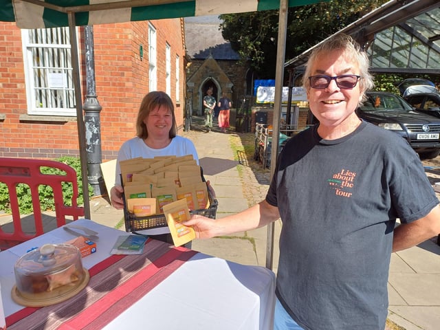 Adam Gray picked up some Curry Pot favourites from event co-organiser Katie Kireja. Image: Dianne Tuckett