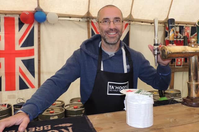 Emmerdale actor James Hooton, who plays Sam Dingle, was helping behind the bar at Metheringham's popular jubilee carnival.