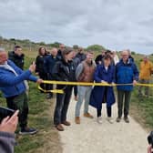 MP Victoria Atkins open the latest leg of the King Charles III England Coast Path at Saltfleetby.