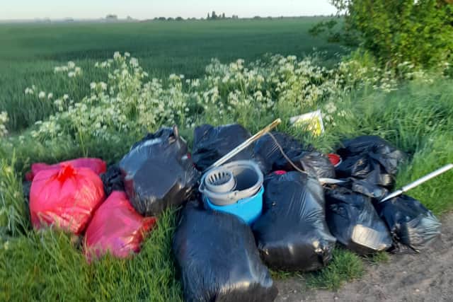 Bags of rubbish left on the roadside in Amber Hill, near Boston.