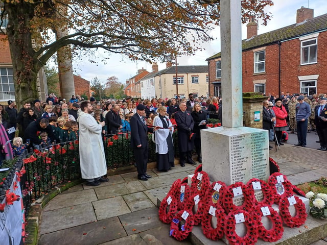 People of all ages and walks of life gathered at the cenotaph