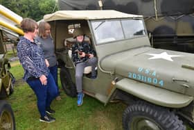 L-R Laurie Mitchell, Sue Mitchell and Zack Mitchell 11 of Ruskington checking out one of the Jeeps.
