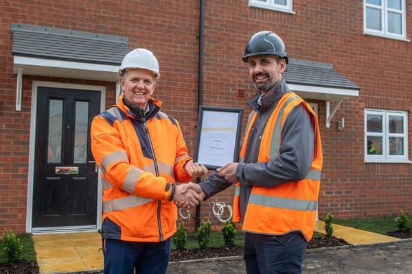 Proud moment: Steve Pettigrew - LABC Warranty and Andrew Smith - Allison Homes Project Manager