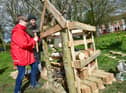 Ethan Scott, aged 12, and Adam Flemming making a Bug Hotel