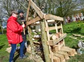 Ethan Scott, aged 12, and Adam Flemming making a Bug Hotel