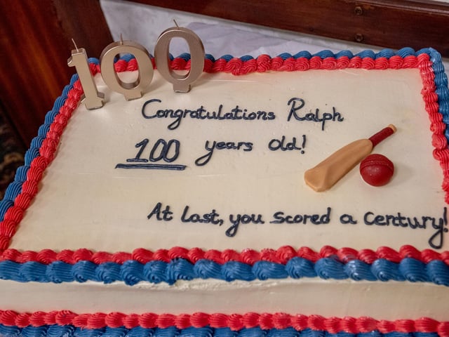 'At last you scored a century' reads Ralph's cricket-inspired cake. As a cricketer, Ralph was more accomplished with the bowl than the bat. Daughter Lesley Morrison said: "He usually came in at 10 and got out LBW." While it may not have been a century, The Standard's archives do record an occasion when Ralph's batting performance helped win the game. In 1955, reporting on a game between Carlton and St Botolph's, the paper wrote: "Much of the credit for this win must go to Town player, Ralph Ottey, who took five wickets for 14 runs and was top scorer - the only player in the game to reach double figures - with 13 not out."
