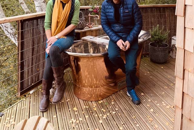 Treetop Hideaway's Jenny Caswell with TV presenter Kevin McCloud.