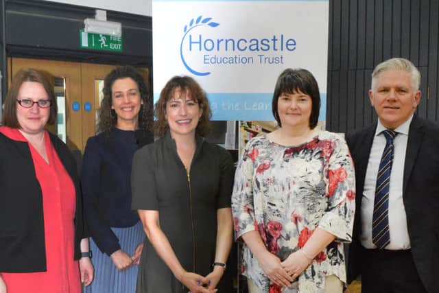 Victoria Atkins MP (centre) with Banovallum's Jenny Kirkwood, Rebecca Nathan, Sandra James, and Damien Davey. Photo: Liv Summers