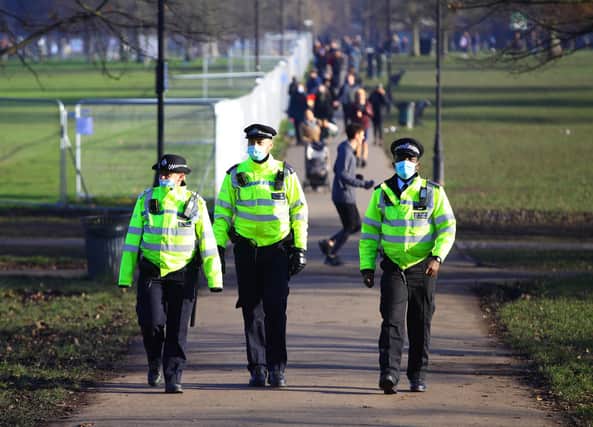Police presence before a proposed anti-lockdown protest in Clapham Common, London.