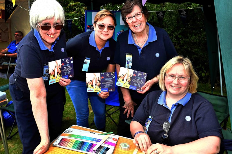 Promoting Girl Guiding via their stall are: Barbara Charity,  Hannah Marriage,  April Watkin and Gillian McBride.