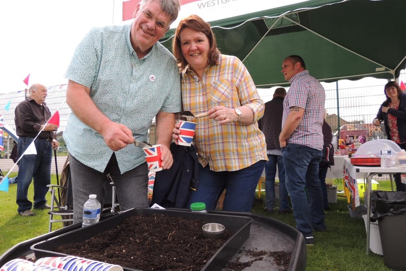Dave and Deb Rigby of South Lincs Church were inviting people to plant giant sunflower seeds on their stall at Ruskington's coronation fun day.