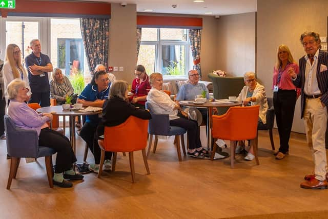 Actor Patrick Mower entertaining guests with stories from his time on Emmerdale.