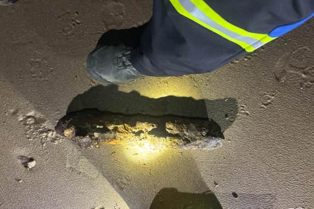 The rusted object was covered by the incoming tide before a disposal team to come out to inspect it.
