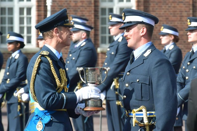 Presenting course awards to the top officer graduates.