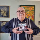 Former Hogsthorpe sub-postmaster Tom Hedges with a photograph of the day his conviction was overturned.