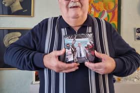 Former Hogsthorpe sub-postmaster Tom Hedges with a photograph of the day his conviction was overturned.