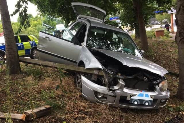 The driver of this Subaru Impreza crashed and abandoned the vehicle after being chased by police.