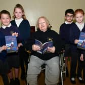 Author Gill Strugnell, of Kirton Skeldyke, with pupils from Sutterton Fourfields CofE Primary School.