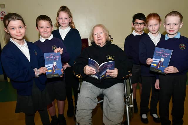 Author Gill Strugnell, of Kirton Skeldyke, with pupils from Sutterton Fourfields CofE Primary School.