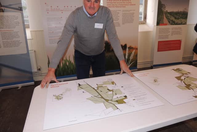 Head of Onshore Development for EDF Renewables, David Cumings, with part of the planned Springwell Solar Farm on display.