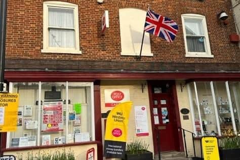 The flag is waving for the coronation at Caistor Post Office