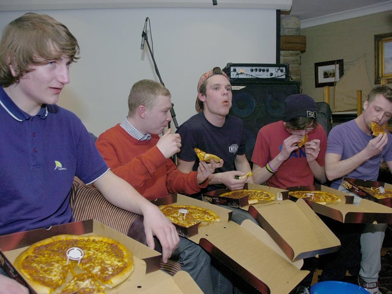 A group of five taking on possibly the world's hottest pizza, courtesy of The Little Italy Pizza Company, at a charity fundraiser at Sleaford's Barge and Bottle. A free pizza was available for anyone who completed the challenge.