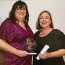 Mandy Jackson (right), CEO of Tanglewood Care Services Ltd, Boston, presenting Jilly Hunt, Manager at Ashdene Care Home in Sleaford, with her award at The Lincolnshire Care Awards 2023.