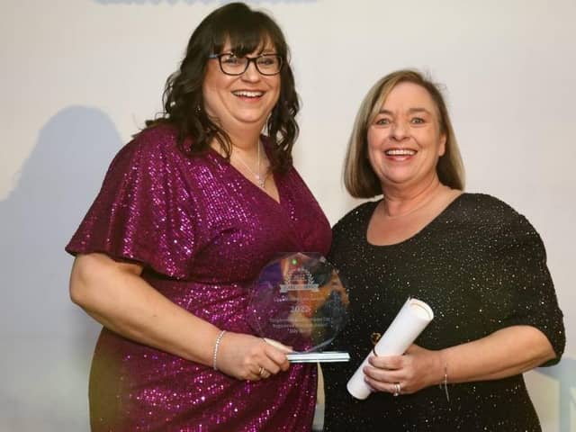Mandy Jackson (right), CEO of Tanglewood Care Services Ltd, Boston, presenting Jilly Hunt, Manager at Ashdene Care Home in Sleaford, with her award at The Lincolnshire Care Awards 2023.